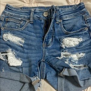 blue jean shorts with holes